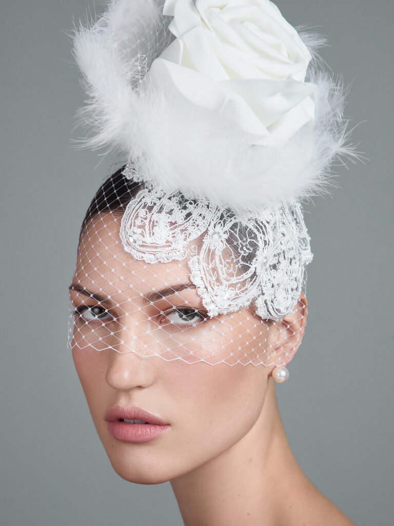 Bride and groom dancing on a beach promenade at golden hour