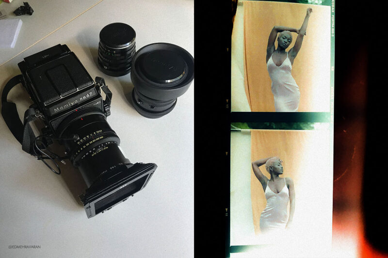 on the left side of the image there is a Mamiya RB67 middle format photo camera. on the right side of the image there is analog film from a model photo shooting.