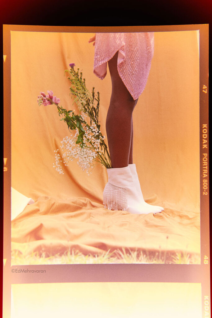 Marie wearing white shoes