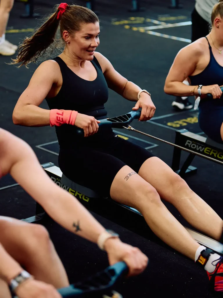 Magda is in rowing station and she's smiling