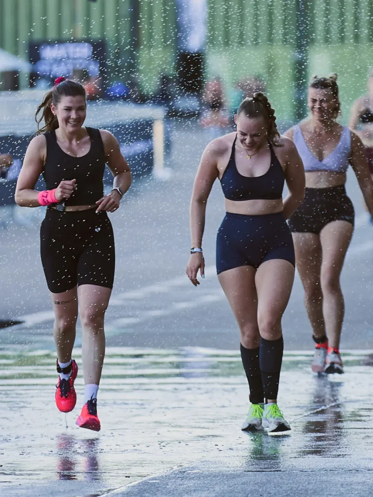 athletes in the pictures in the left side of the pictures athlete called maglash is wearing black short black top and red HYROX Puma shoes